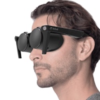 Model wearing Shiftall's lightweight VR headset Megane X.