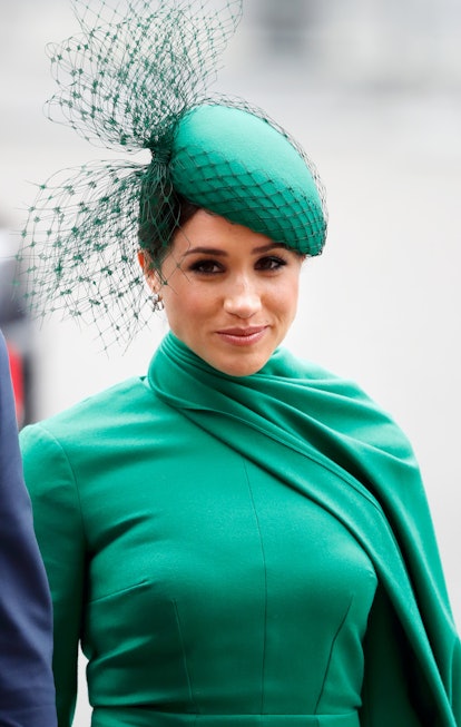 Meghan Markle wearing a green hat and veil