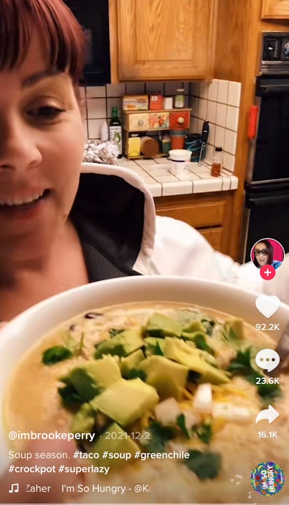 A woman makes a creamy taco soup recipe on TikTok. 