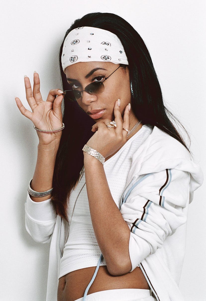 Aaliyah lowering her sunglasses
