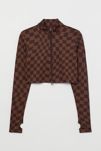 H&M brown checked zip-up top.
