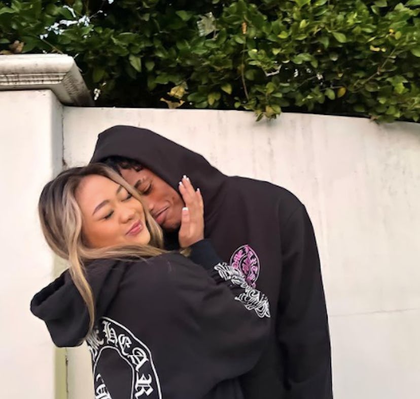 Sunisa Lee and boyfriend Jaylin Smith in matching sweatshirts.