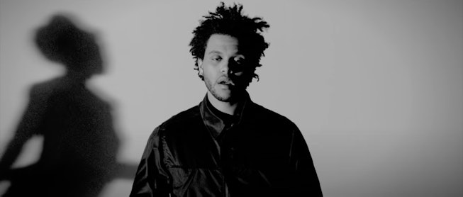 The Weeknd in the “Wicked Games” music video from his Trilogy album.