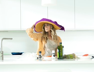 Carrie wearing a big hat in And Just Like That...