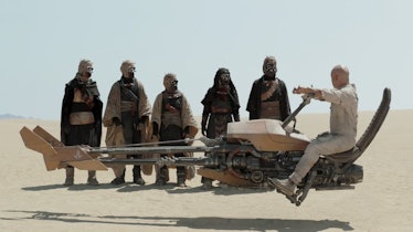 Boba Fett with the Tusken Raiders.