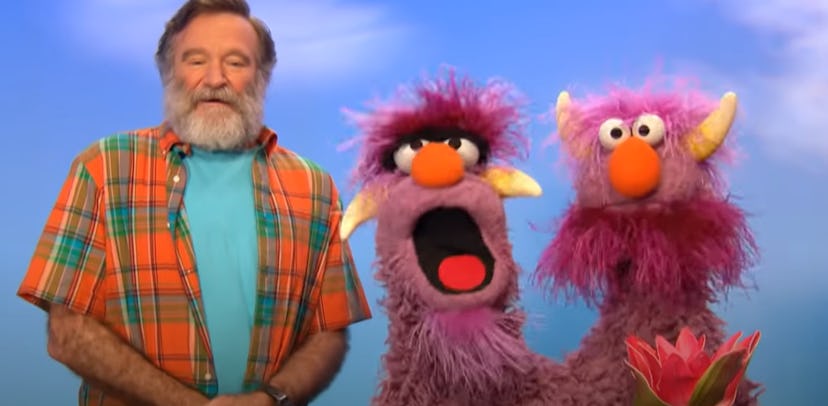 Robin Williams and the Two-headed Monster demonstrate the word "Conflict."