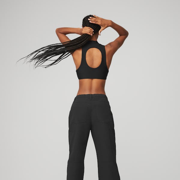 Alo Yoga's campaign photo for the Edge Trousers. 