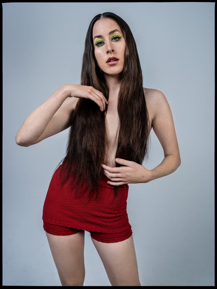 Alana Haim wears Prada shorts.
