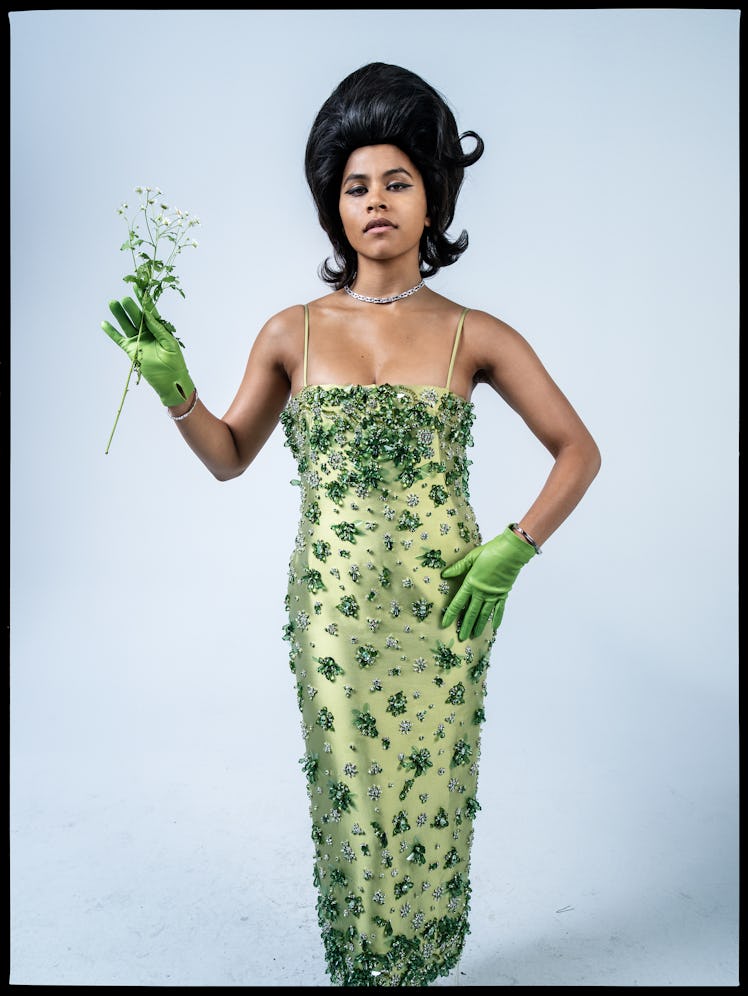 Zazie Beetz wears a Miu Miu dress; Bulgari necklace and bracelets; stylist’s own gloves.