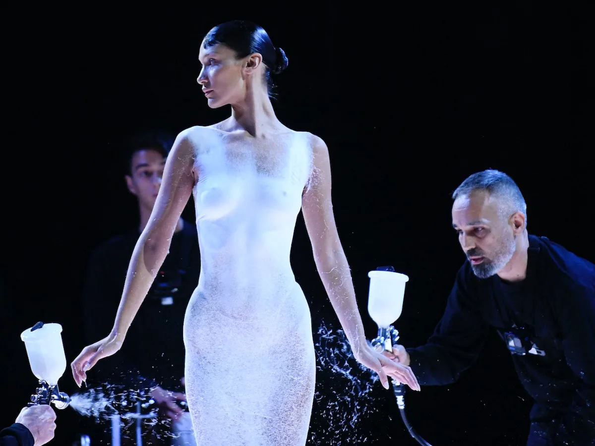Bella Hadid's Spray-Painted Coperni Spring 2023 Dress Video Is Unreal Bella Hadid's Spray-Painted Coperni Spring 2023 Dress Video Is Unreal