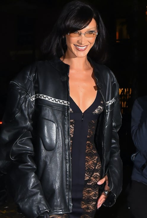 bella hadid wearing a black biker jacket over a sheer dress on her 26th birthday in NYC