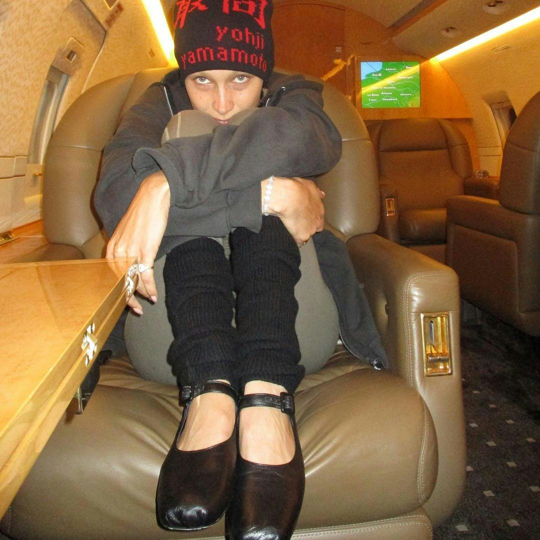 Bella Hadid wearing ballet slippers and leg warmers