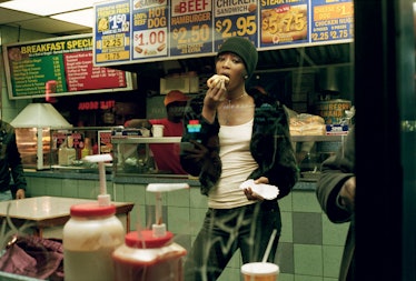 Model Naomi Campbell eating a hotdog. 