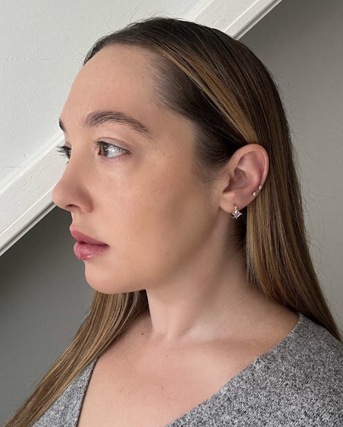 Bustle beauty writer Olivia Rose Ferreiro's snakebite ear piercing, done at Studs in NYC.