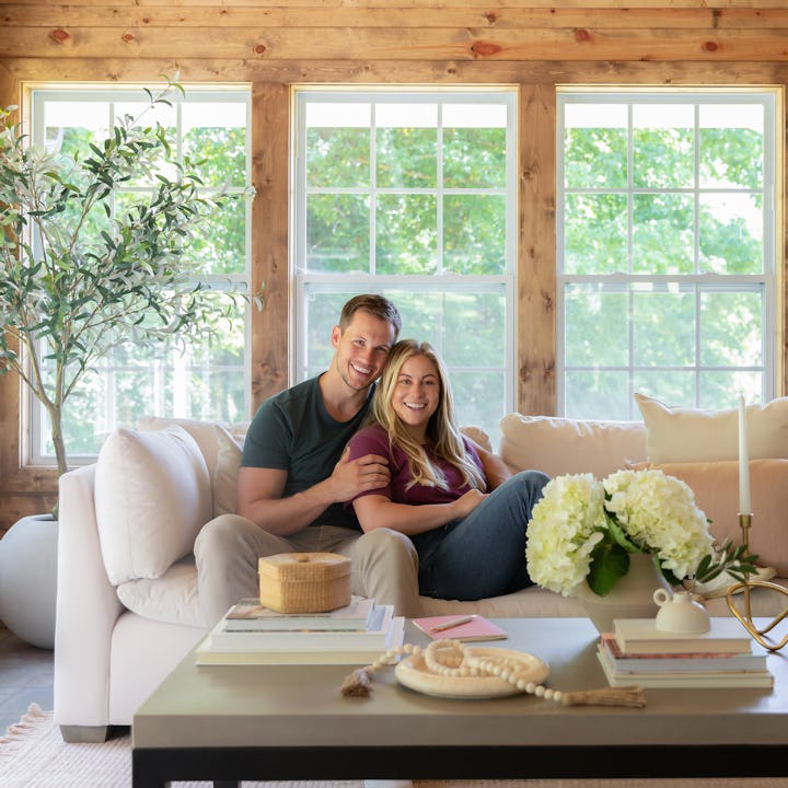 Shawn Johnson and Andrew East pose together in their new home office.