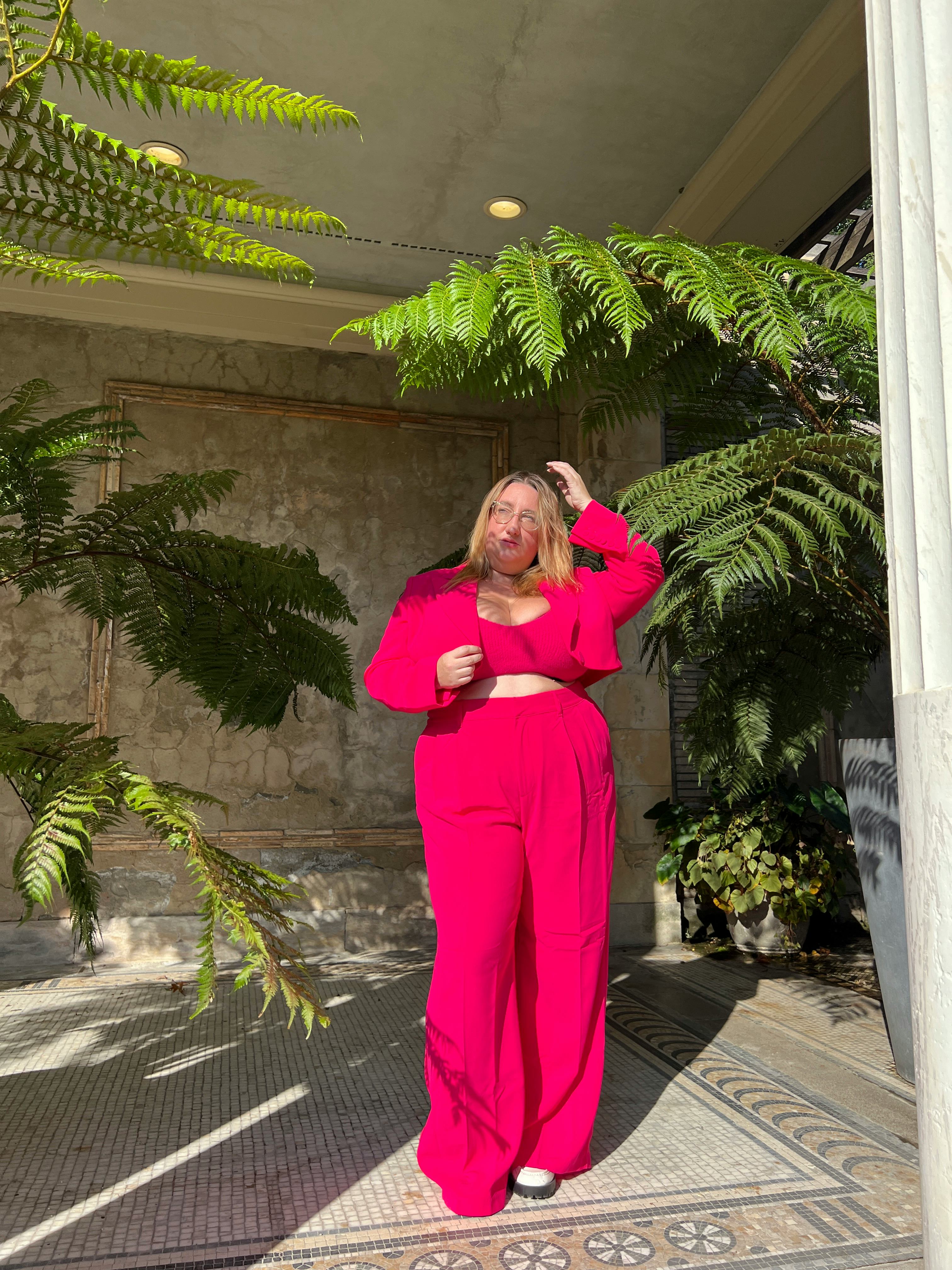 Sarah Chiwaya wearing pink suit dress by Sergio Hudson x Target