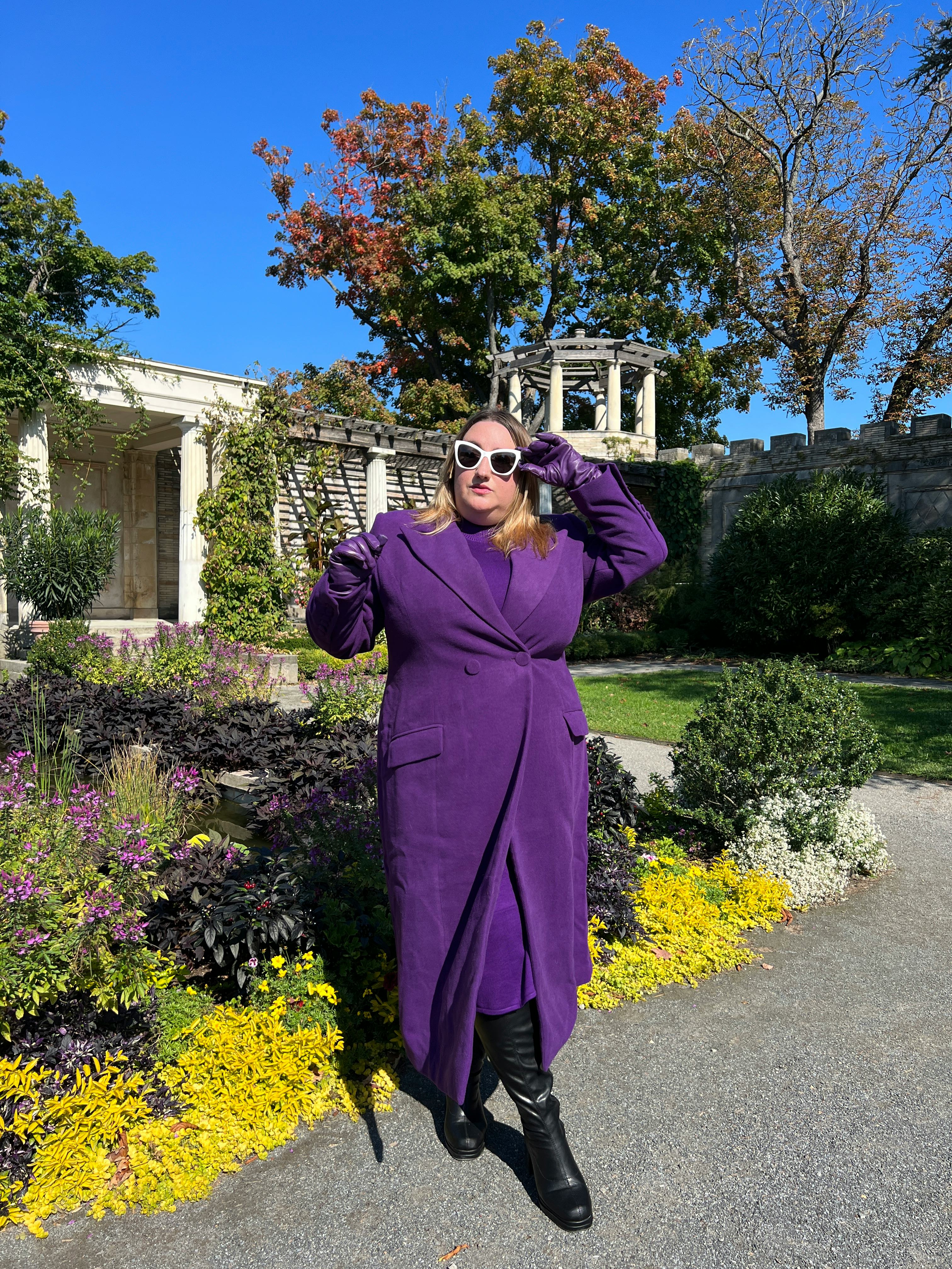 Sarah Chiwaya wearing purple coat by Sergio Hudson x Target