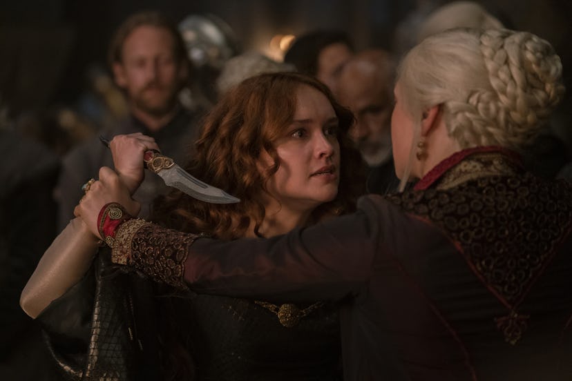 Alicent (Olivia Cooke) cutting Rhaenyra (Emma D'Arcy) with the catspaw dagger in 'House of the Drago...