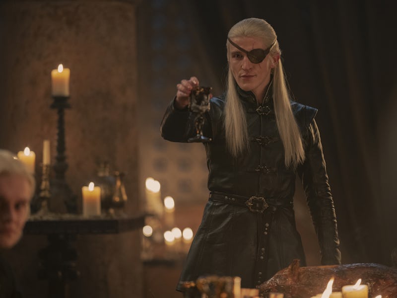 Aemond Targaryen (Ewan Mitchell) holds up a goblet in House of the Dragon Episode 8