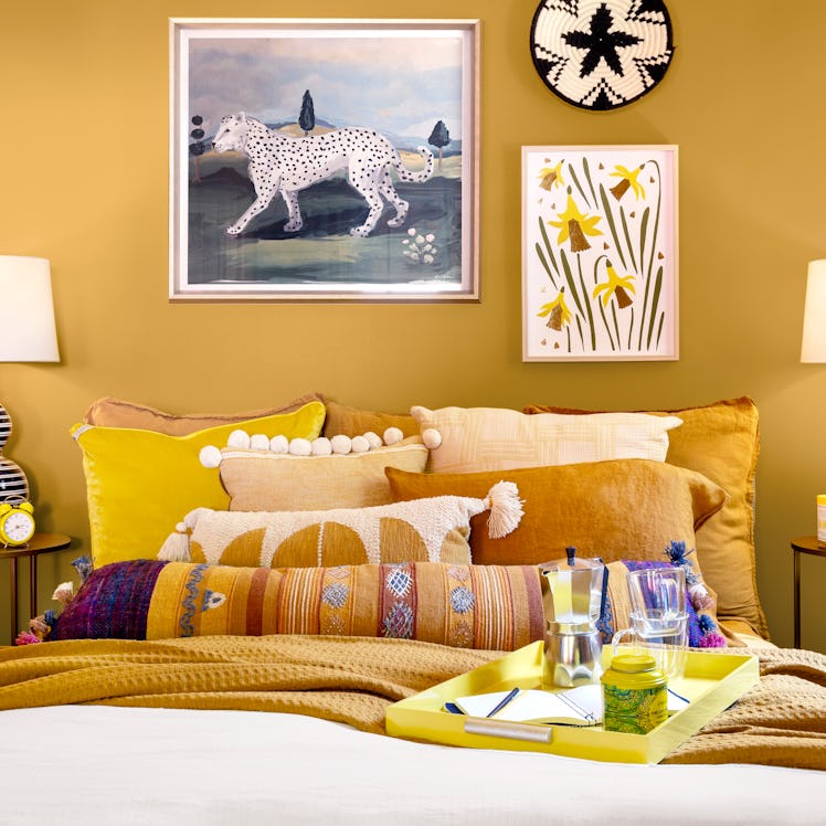 The House of HomeGoods has a yellow bedroom. 