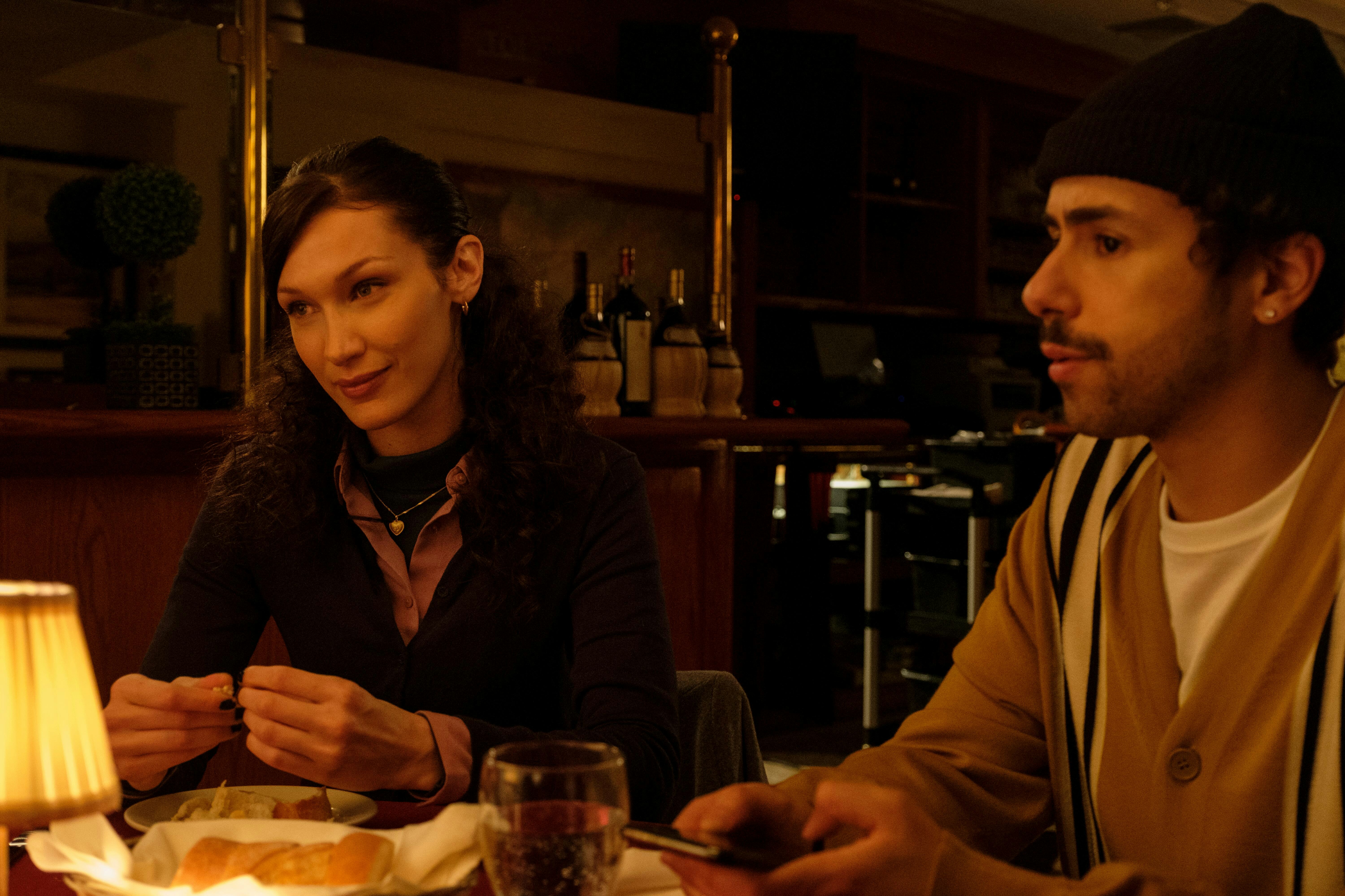 A still from the show Ramy, where Bella Hadid plays a character that's styled based off of Pam from ...