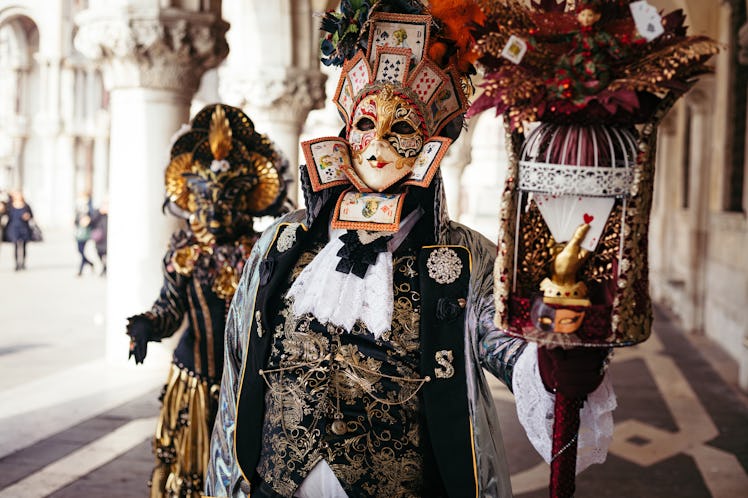 Masked revelers in the Italian city of Venice. 