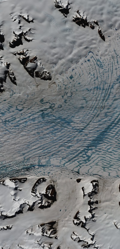 Conchie, Hubert, Saturn, Venus and Uranus glaciers draining into a meltwater-laden George VI Ice She...
