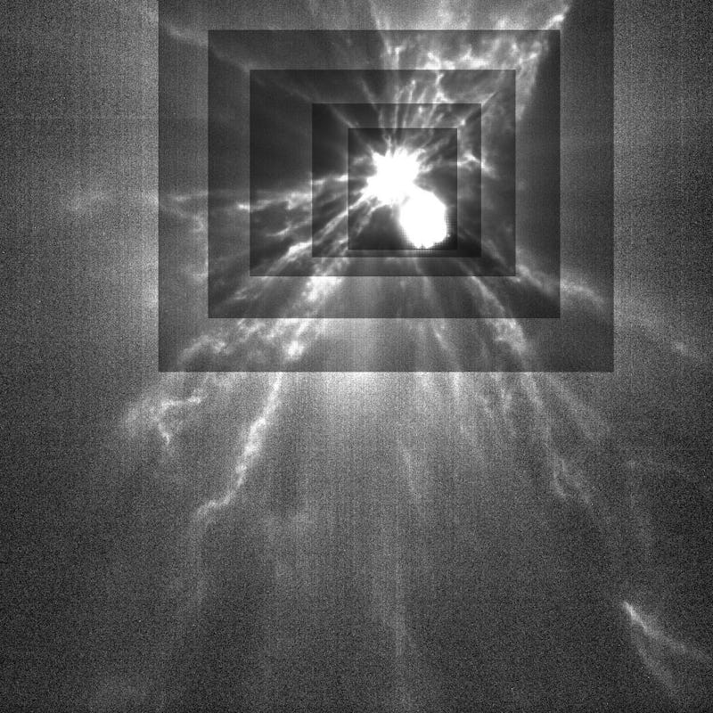 This image from ASI’s LICIACube show the plumes of ejecta streaming from the Dimorphos asteroid afte...