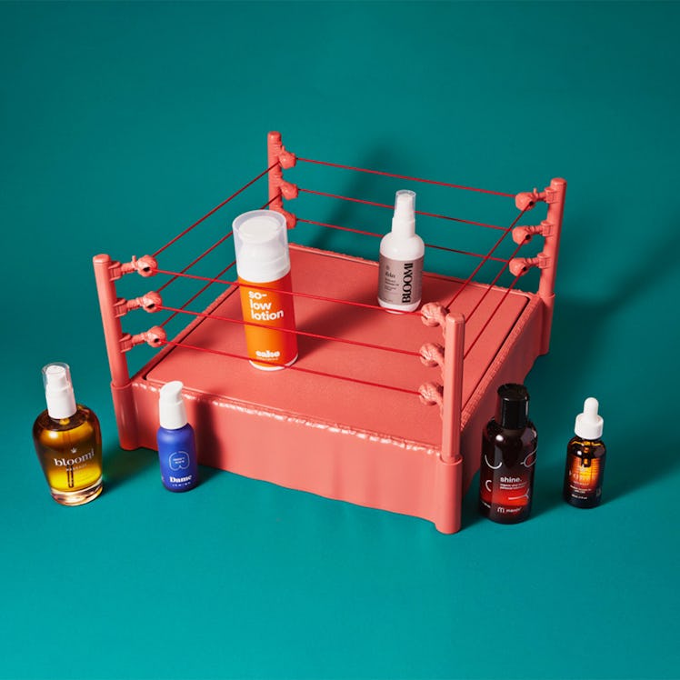 Lubes and massage oils in and around a miniature boxing ring