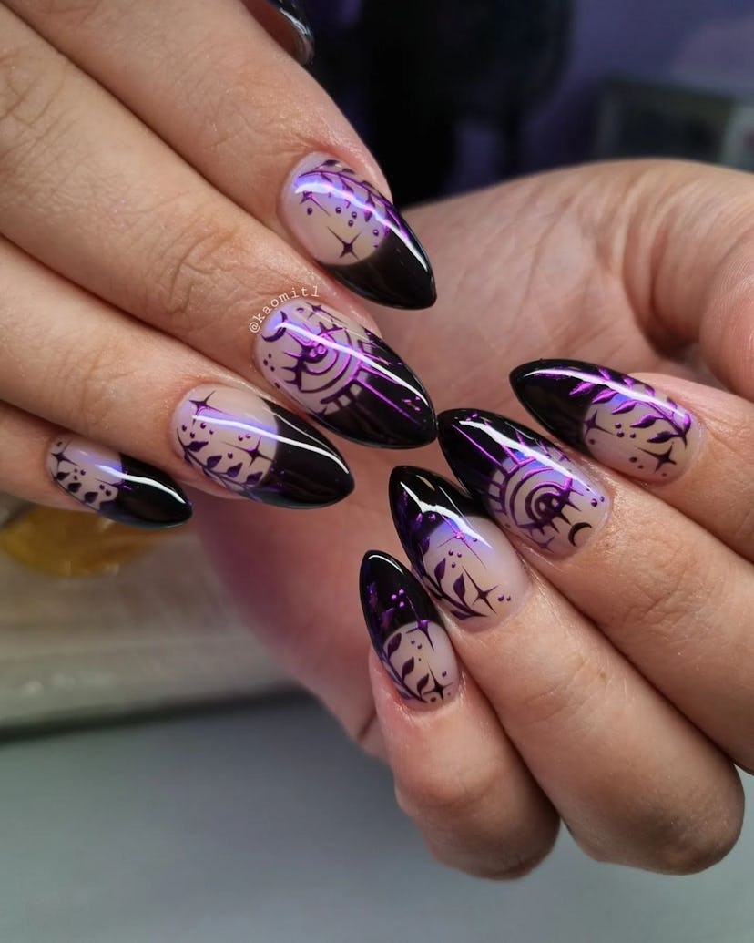 Black French tips with purple stars and chrome nail polish make for bewitching Halloween nail art.