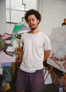 A portrait of Moya in his studio