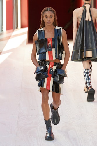 a model on the louis vuitton runway