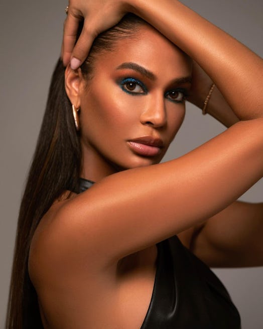Model in dark blue sparkly eyeshadow