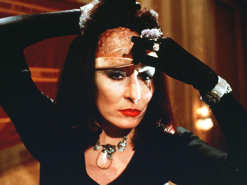 Anjelica Huston as Grand High Witch in The Witches peeling her face off