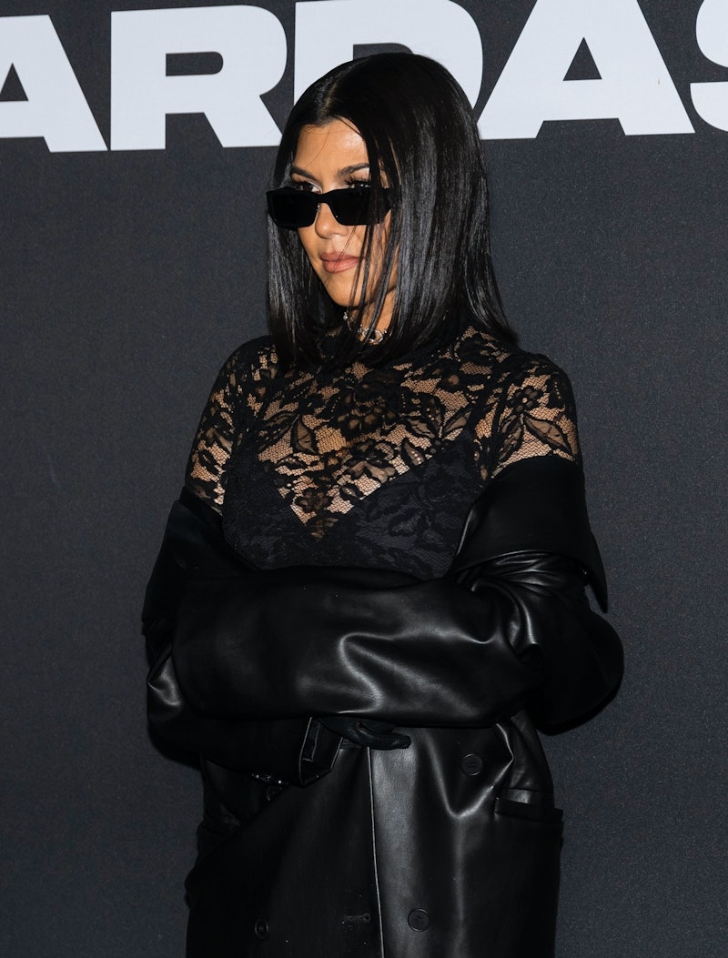 kourtney kardashian wearing an all-black outfit during new york fashion week