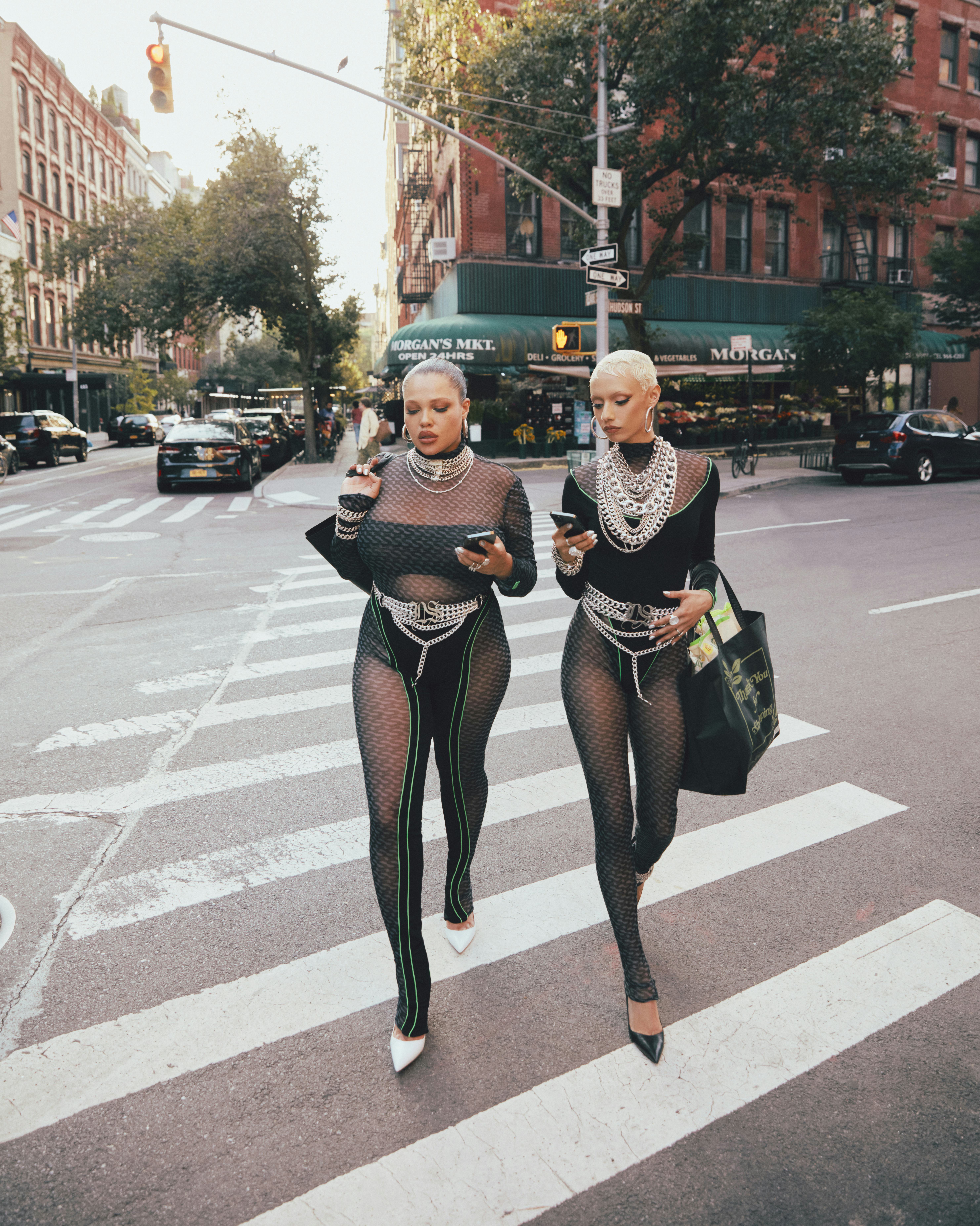 Models wearing LaQuan Smith Cash by Cash App