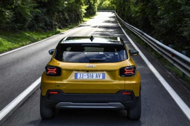 The back of the yellow Jeep Avenger electric SUV