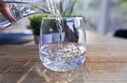 Gin being poured in a glass