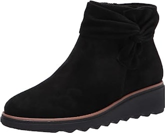 If you're looking for cute ankle boots for plantar fasciitis, consider these Clarks booties.