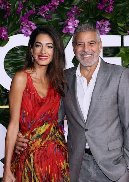 Amal Clooney and George Clooney attend the premiere of Universal Pictures' "Ticket To Paradise"
