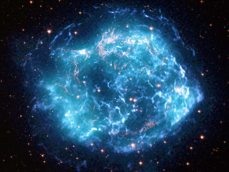 A hazy ball of turquoise and neon blue lightning in space