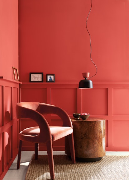 Corner of a living room painted in Benjamin Moore's Raspberry Blush