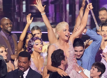 Selma Blair, smiling, is lifted into the air by members of the 'Dancing with the Stars' cast