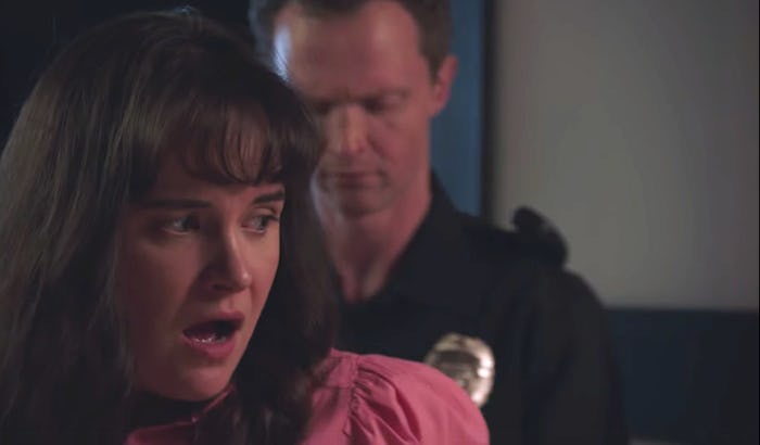 A woman looks distressed as she is being arrested in Eric Swalwell's "Lock Her Up" ad.