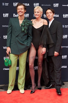 Harry Styles(L), Emma Corrin(C) and David Dawson pose for photographers at the premiere of My Police...