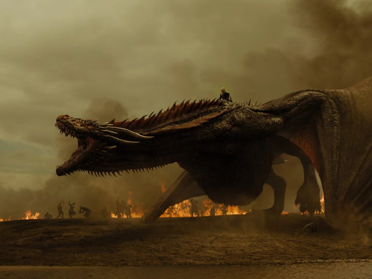 Drogon from the game of thrones setting fire to a lannister convoy