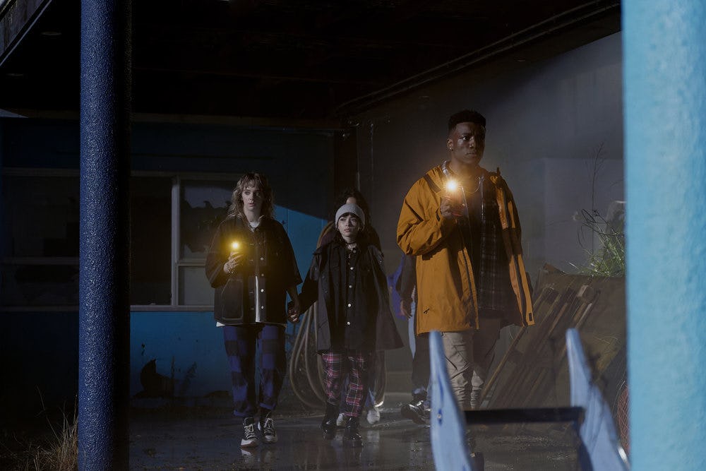 Jess McLeod as Janae, Melissa Collazo as Maeve Rojas, and Chibuikem Uche as Cooper in 'One Of Us Is ...