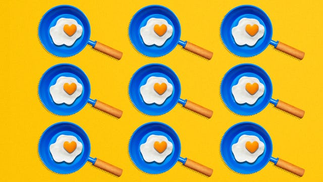 An illustration of nine blue pans with fried eggs