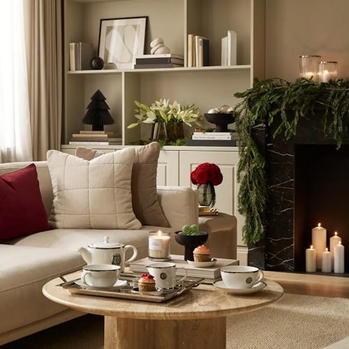 Living room decorated with items found in H&M Home’s 2022 Holiday Shop.