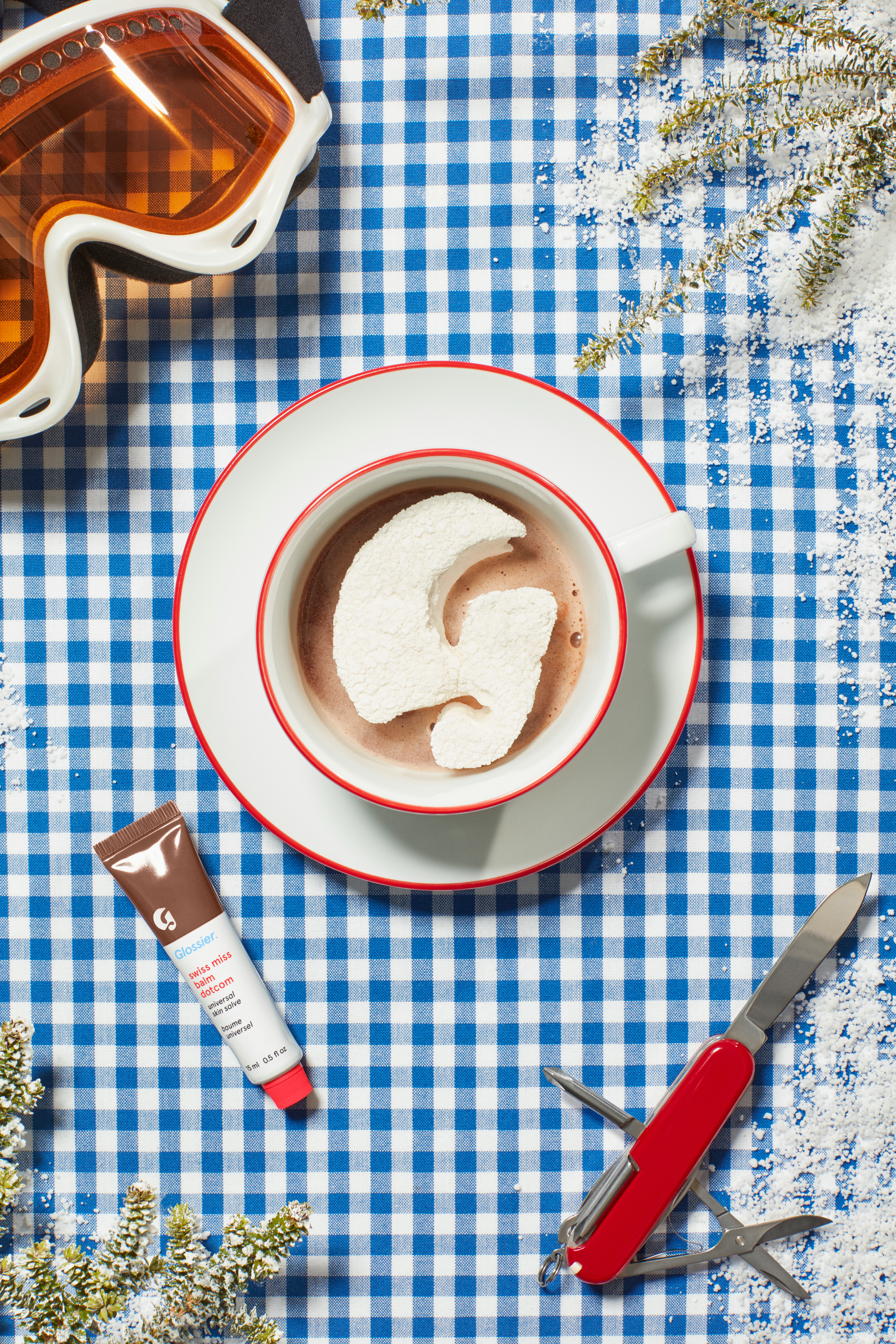 Glossier's famous Balm Dot Com just got even better. The new Glossier x Swiss Miss Balm Dot Com laun...